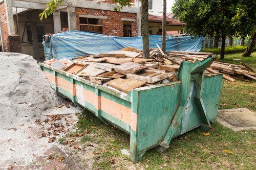 Professional loft clearance team at work in Stoke Newington home